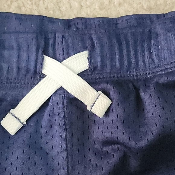 Blue carter's mesh shorts Size 7 - Picture 7 of 11